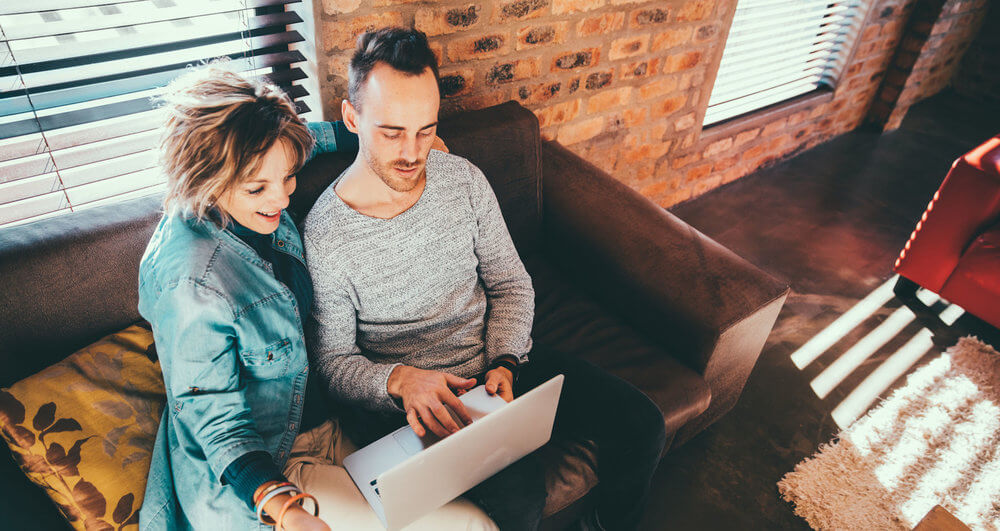 mother son reviewing finances and debt