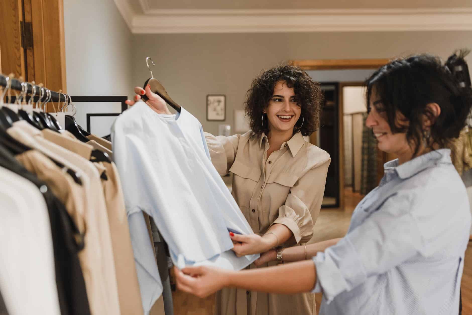 pexels photo 5418899 women buying clothes together