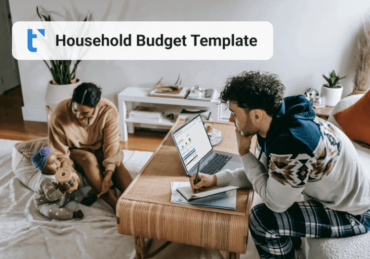 Image of a couple managing their household budget using a household budget template.